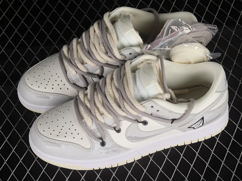 All Categories Nk SB Dunk Series Nk SB Dunk Low Low-top Sneakers Nk Dunk Low Retro "Coconut Milk" Vibe Wind Distressed Paper Plane Travel Graffiti Customized Deconstructed Strap Casual Sneakers DJ6188-100